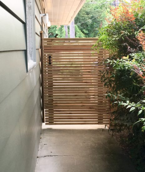 Gate with skinny boards on the horizontal