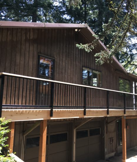 Deck walkway with aluminum rail and cedar cap